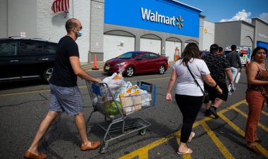 Walmart raises outlook as groceries boost sales, inventory glut recedes