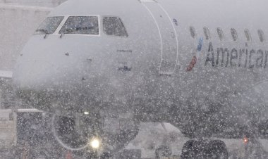 FedEx, UPS warn severe winter storm could delay holiday packages, and airlines cut more flights
