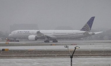 Airlines cancel more than 12,000 flights during severe winter storms and scramble to rebook holiday travelers