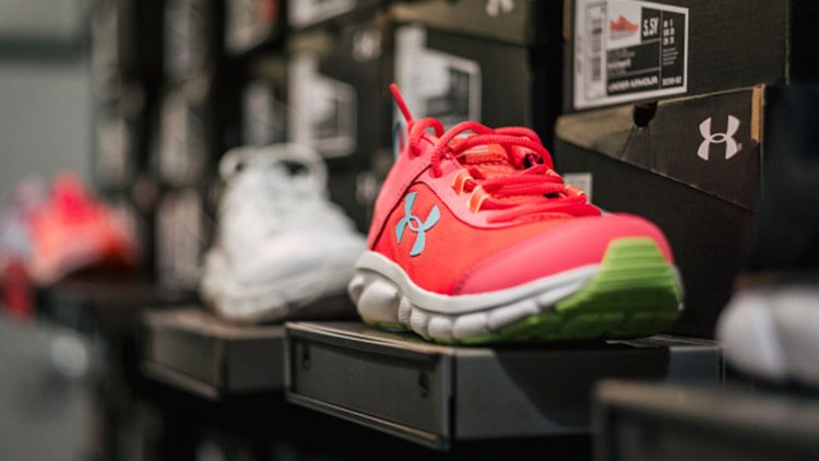 Under Armour raises outlook as company defends high inventory level