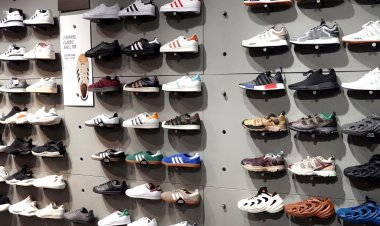 Adidas warns of first annual loss in three decades and cuts dividend after Ye split