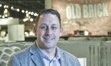 Old Brick Furniture buys retail plaza to expand again