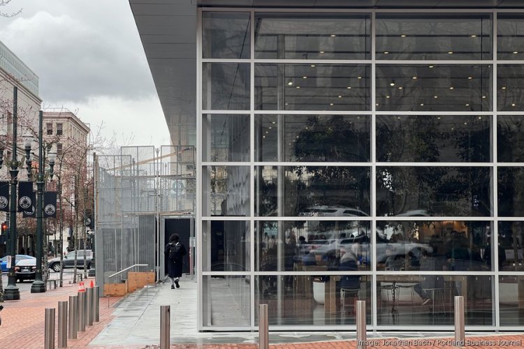 Downtown Portland Apple store begins to take down fence